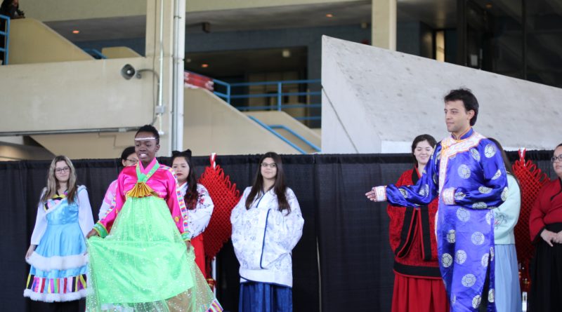 MDC students modeling traditional Chinese outfits.