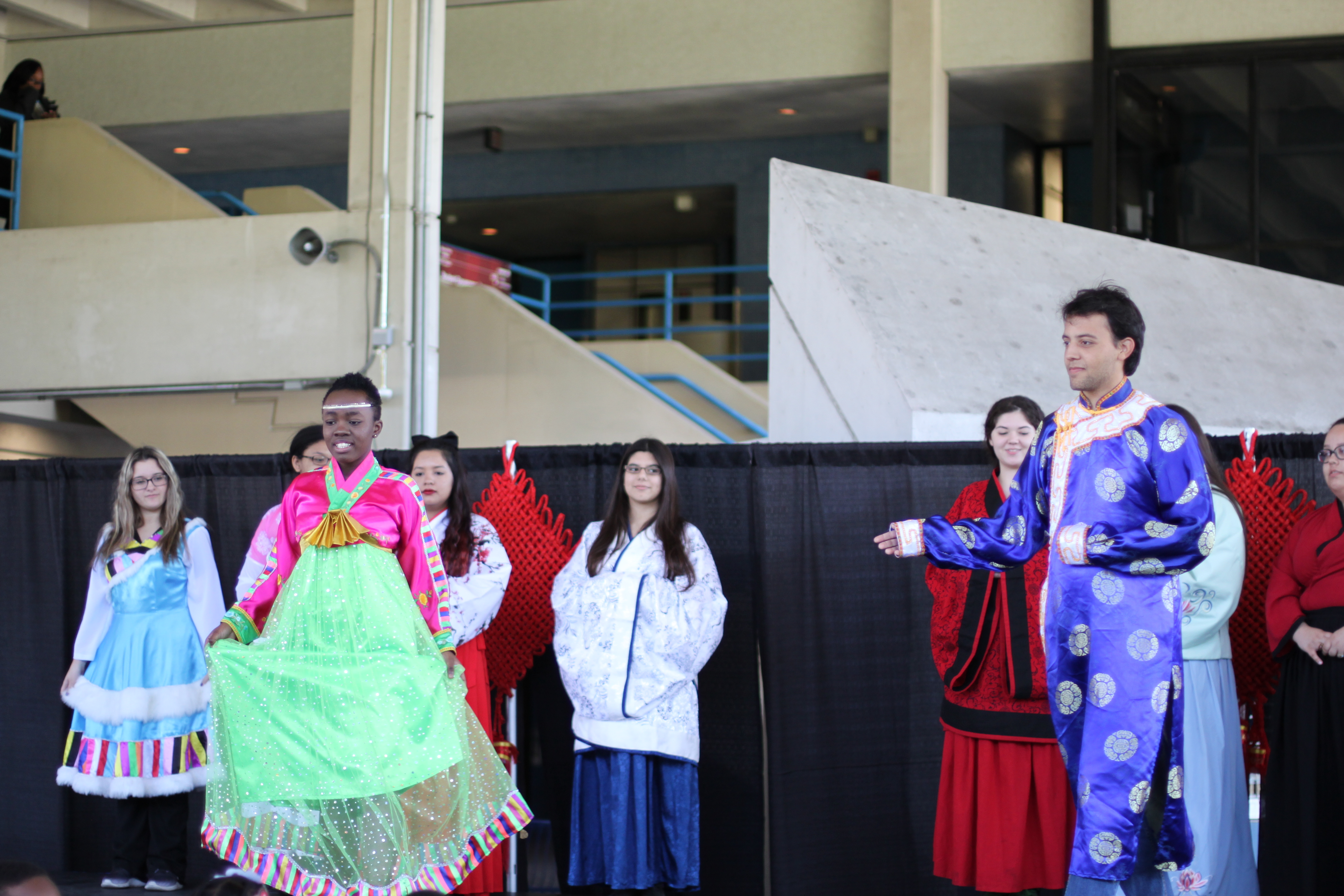 MDC students modeling traditional Chinese outfits.
