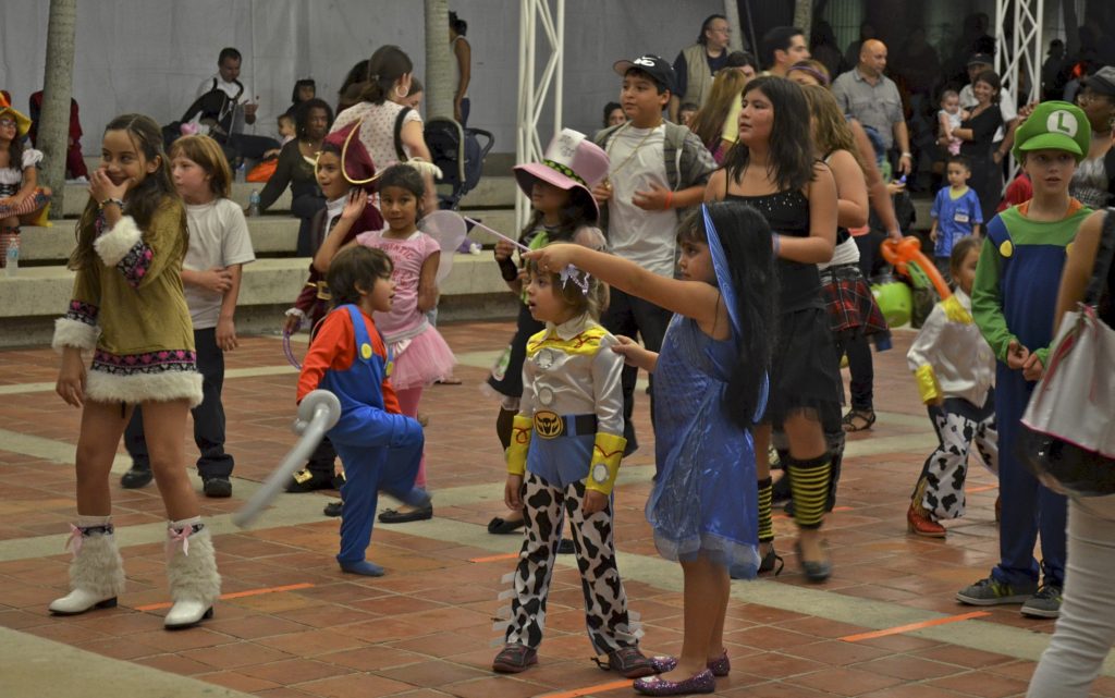 A group of children in their Halloween costumes.