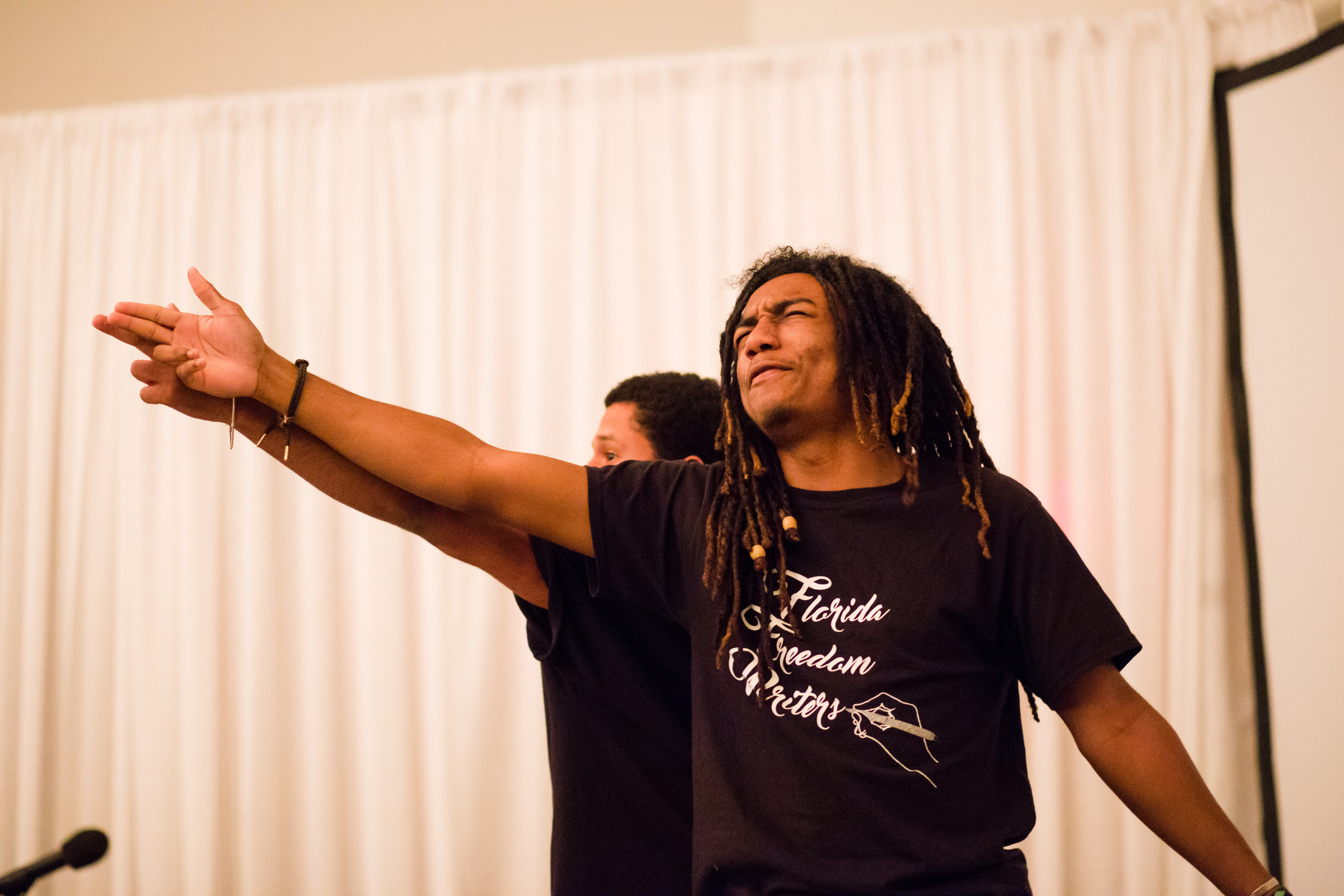Poets from The Florida Freedom Writers performing their poetry.