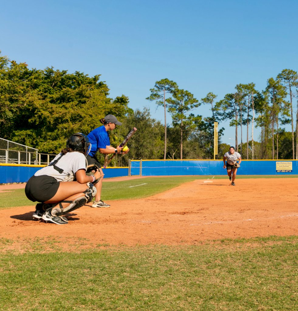 Lady Sharks practicing on the field.