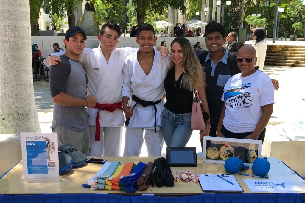 Members of the karate club posing for a picture at the Wolfson Campus.