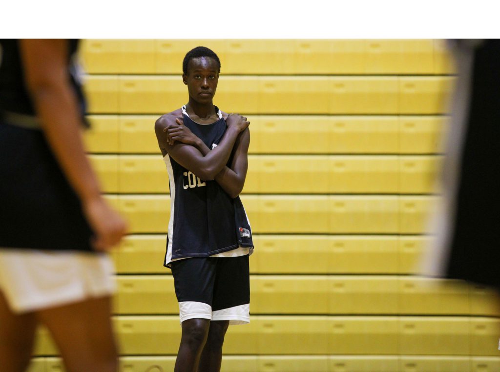 Soumare watching her teammates on the court.