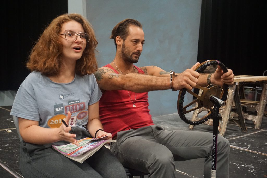 Actors Kristen Hoffman and Enrique Galán during rehearsal.