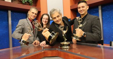 The people behind MDC-TV posing with their awards.