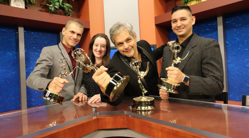 The people behind MDC-TV posing with their awards.