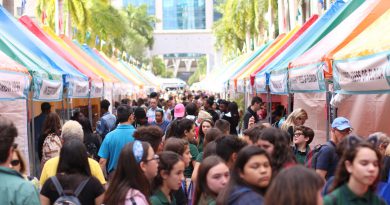 Young students enjoying the Miami Book Fair.