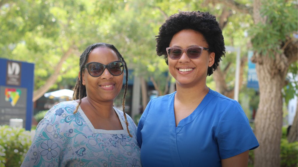 Shawna Powell and Zayna Bryan posing for the camera.