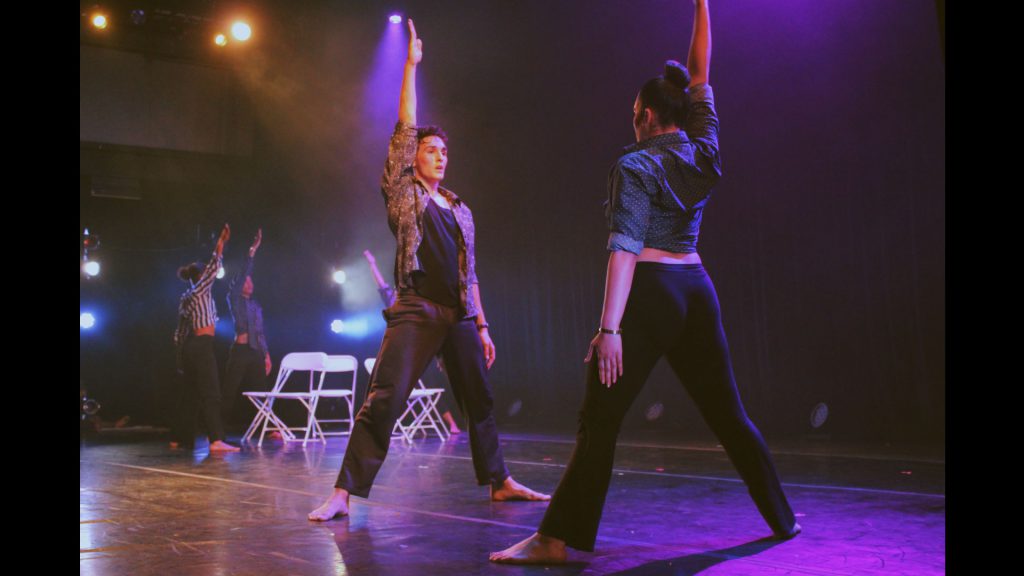 Students dancing on stage.