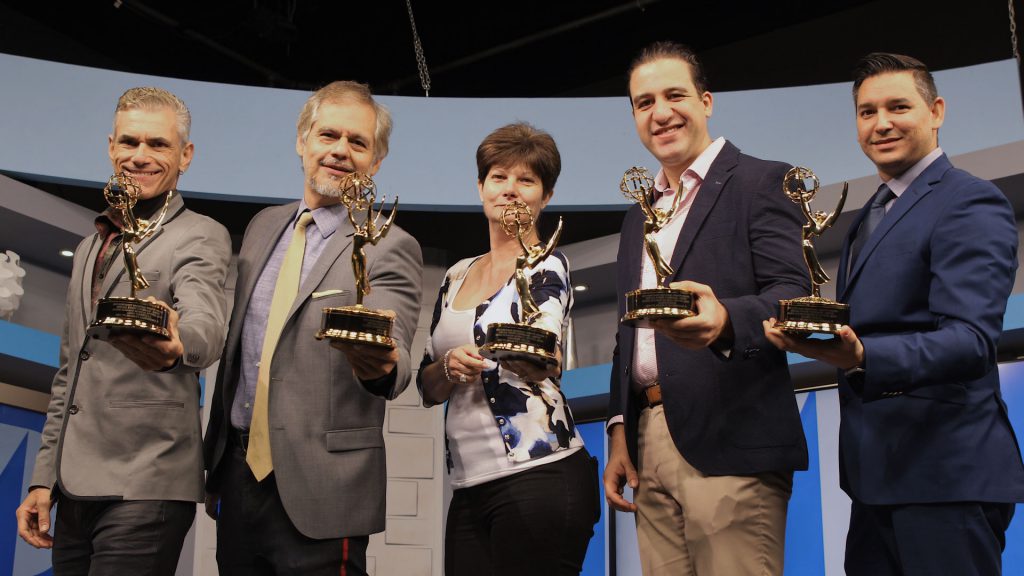 The MDC-TV team posing with their awards.