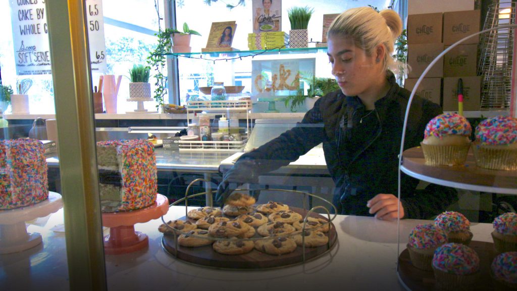 Baker Kaitlyn Quintero with baked cookies.