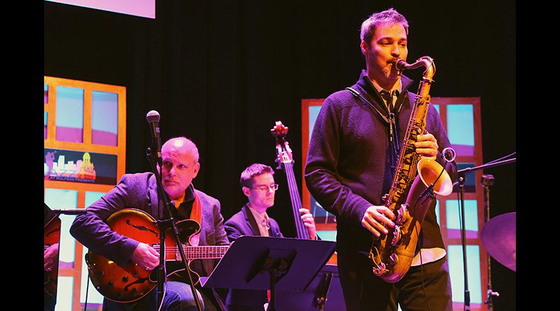 Jazz musician performing on stage.