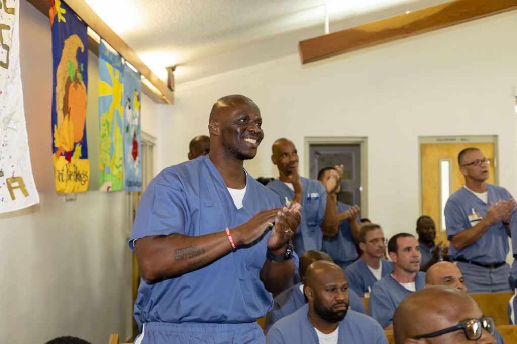 Incarcerated people graduating.