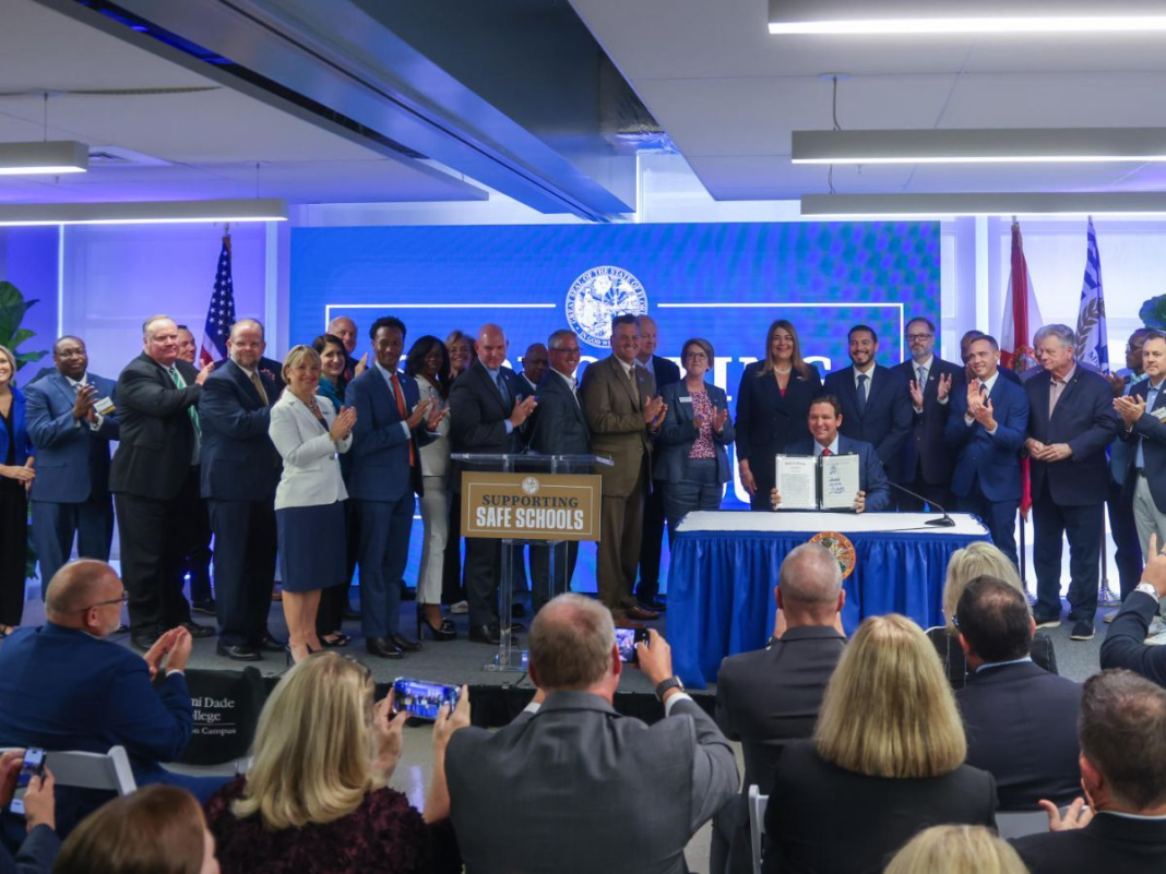 The Florida Board of Education signed a bill to expand K-12 school safety programs to state colleges and universities during their monthly meeting at Wolfson Campus on May 14.